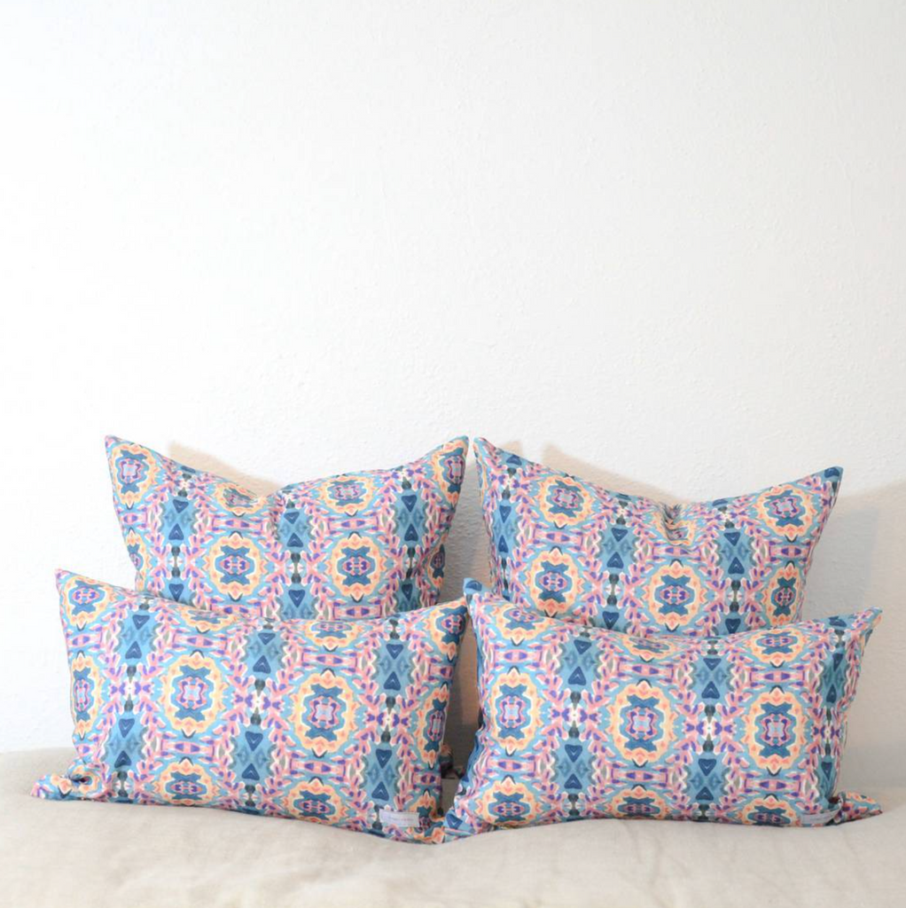 Blue and purple floral patterned pillow by bunglo, sold at anthropologie