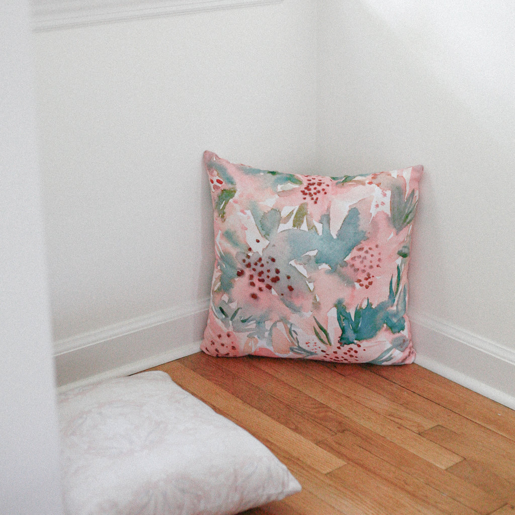 PInk and peach lily floral fabric and pillow by bunglo sold at anthropologie