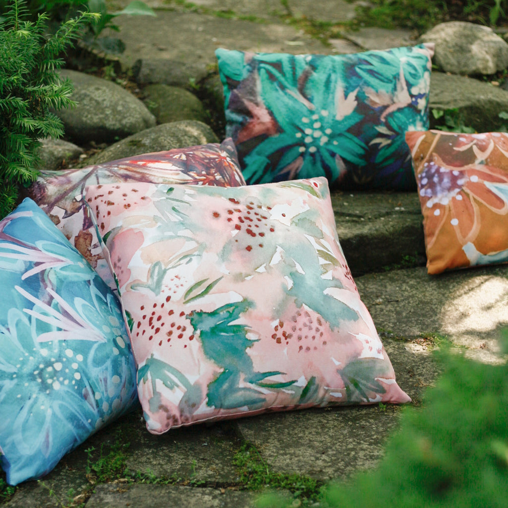PInk and peach lily floral fabric and pillow by bunglo sold at anthropologie